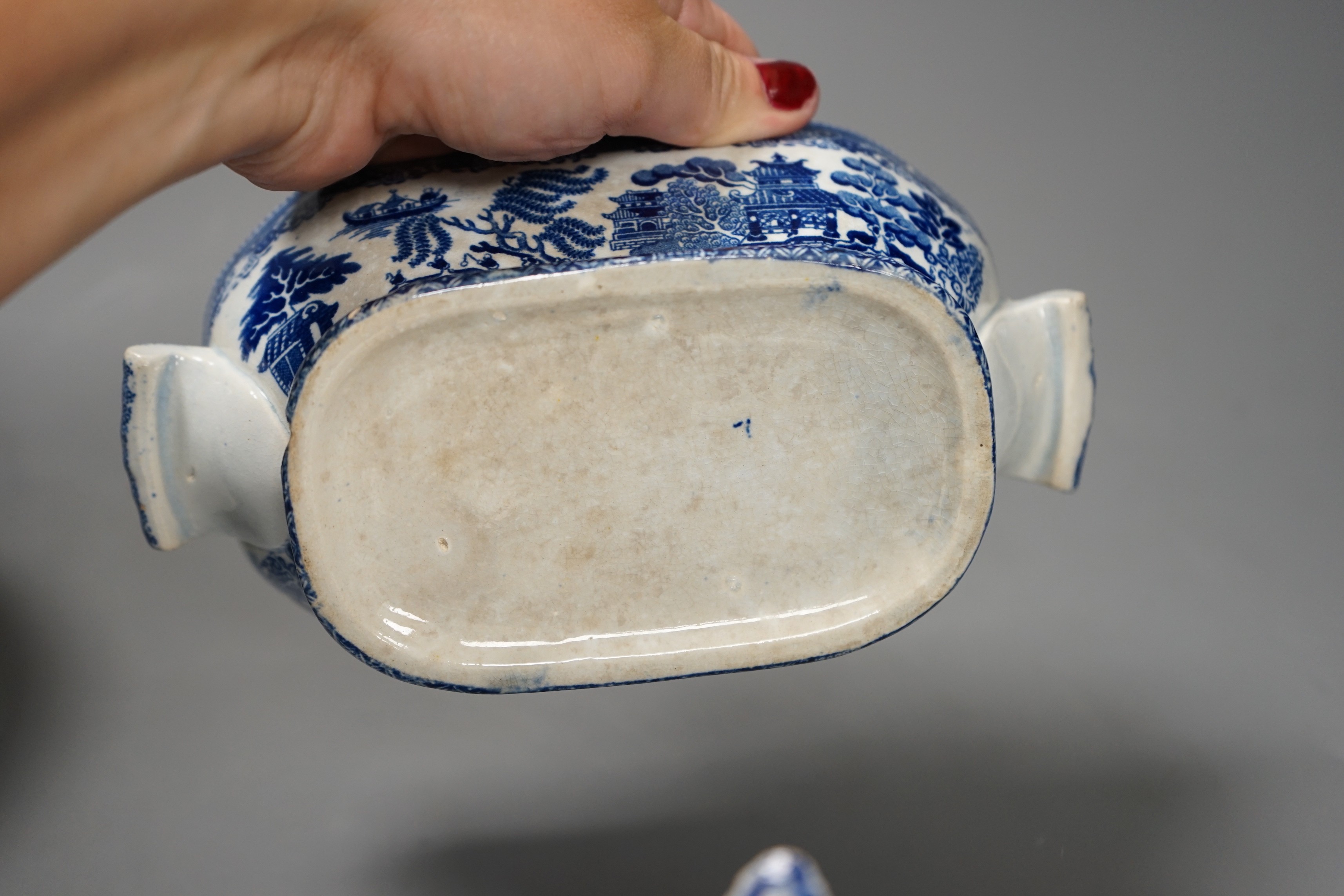 A Chinese famille rose jar and cover, another jar and two English pottery pieces